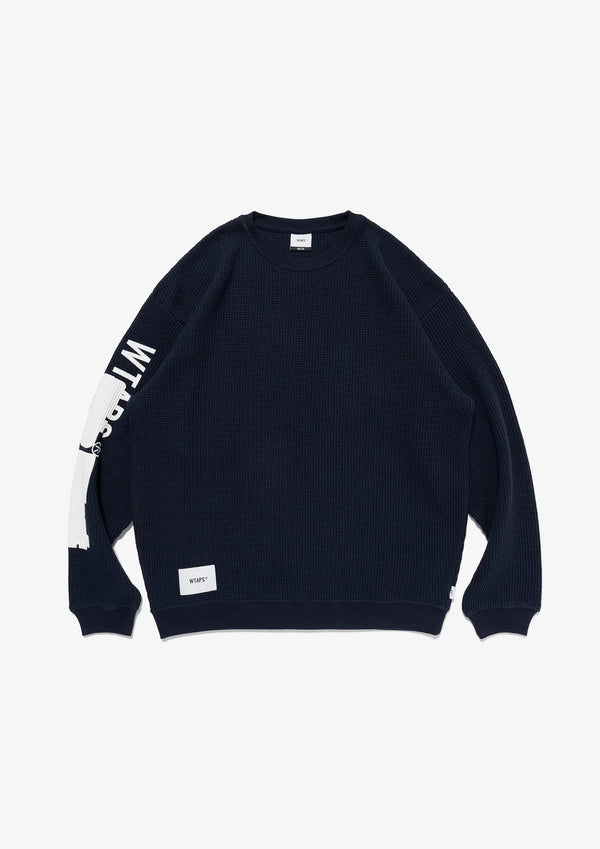 【WTAPS|ダブルタップス】WAFFLE RIBBED / LS / COTTON
厚手のコットンワッフル生地を使用したロングスリーブカットソー。
右袖にプリントモチーフ、バックに刺繍モチーフを配置。
FABRIC:コットン 100%
品番:262ATDT-CSM27
26AW