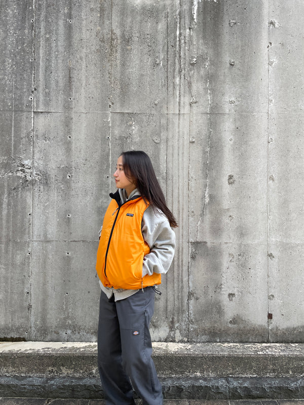 【SEDAN ALL-PURPOSE | セダンオールパーパス】REVERSIBLE DOWN VEST/リバーシブルダウンベスト(BLACK×MANGO)