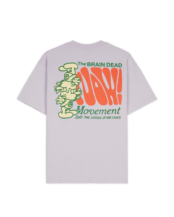 THE NOW MOVEMENT T-SHIRT/ザ ナウ ムーブメント(LILAC)