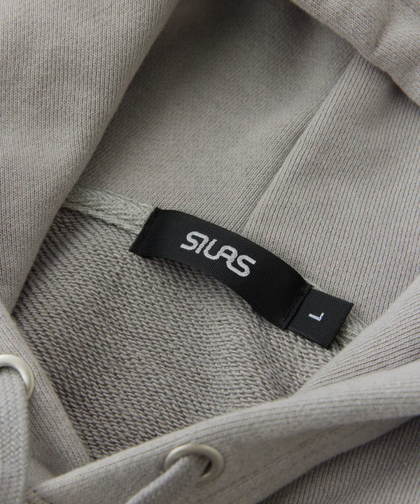 【SILAS|サイラス】RUIN LOGO SWEAT HOODIE/ ルイン ロゴ スウェット フーディー(GRAY) - STREAM【SILAS|サイラス】RUIN LOGO SWEAT HOODIE/ ルイン ロゴ スウェット フーディー(GRAY)STREAML